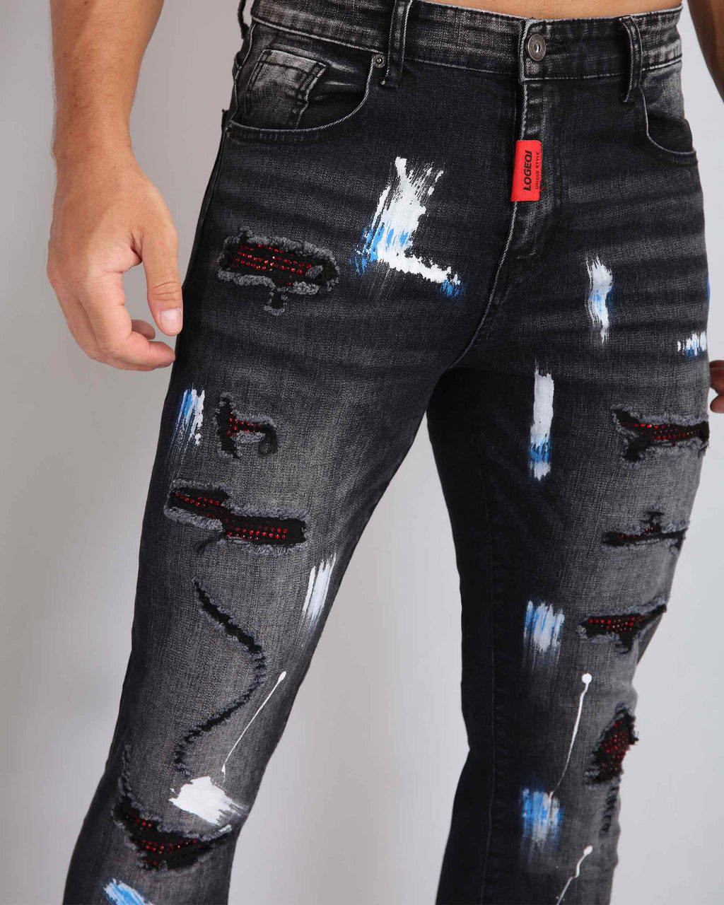 Ripped Black Jeans with Graffiti Paint Drawing - The Rising Fenix