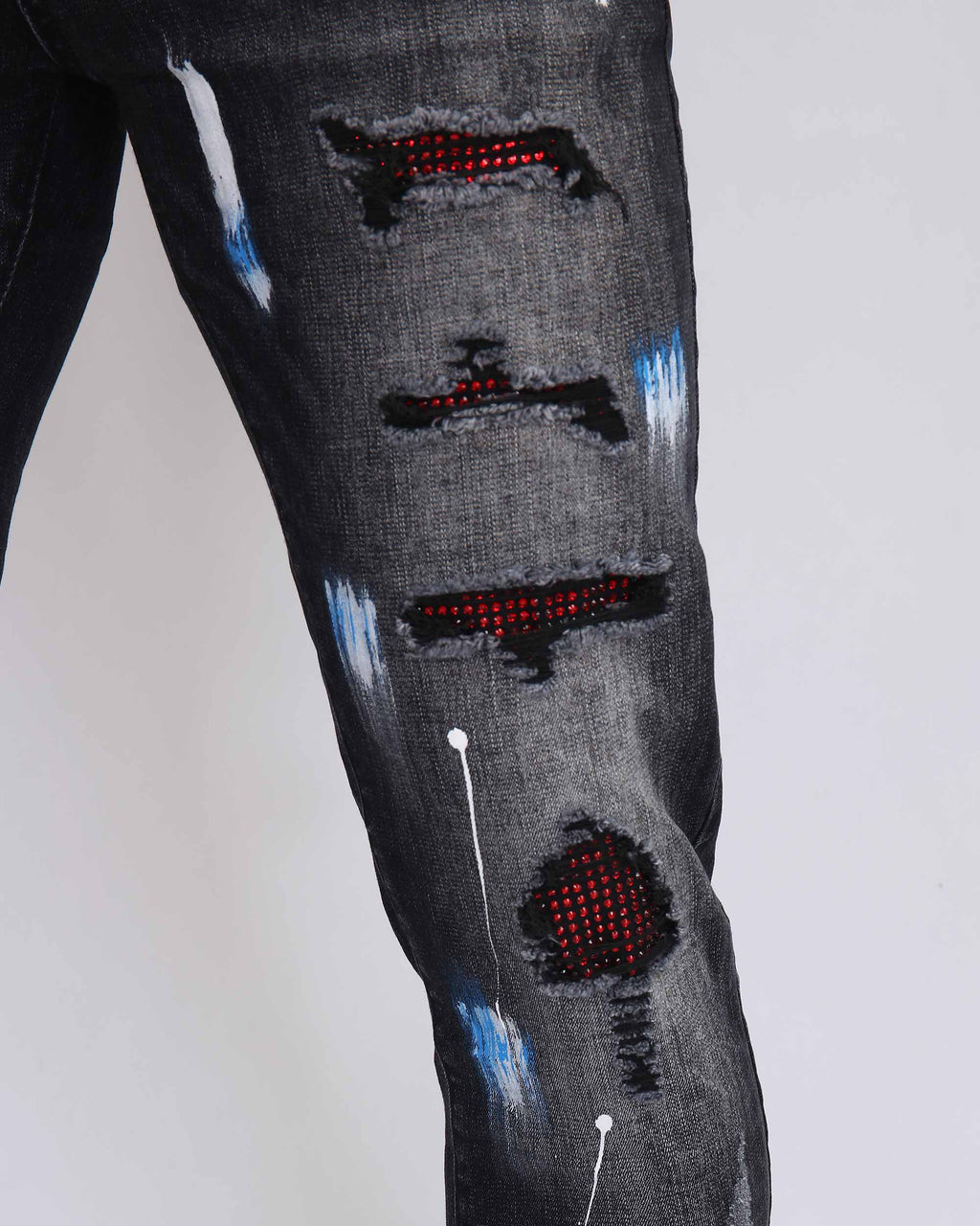 Ripped Black Jeans with Graffiti Paint Drawing - The Rising Fenix