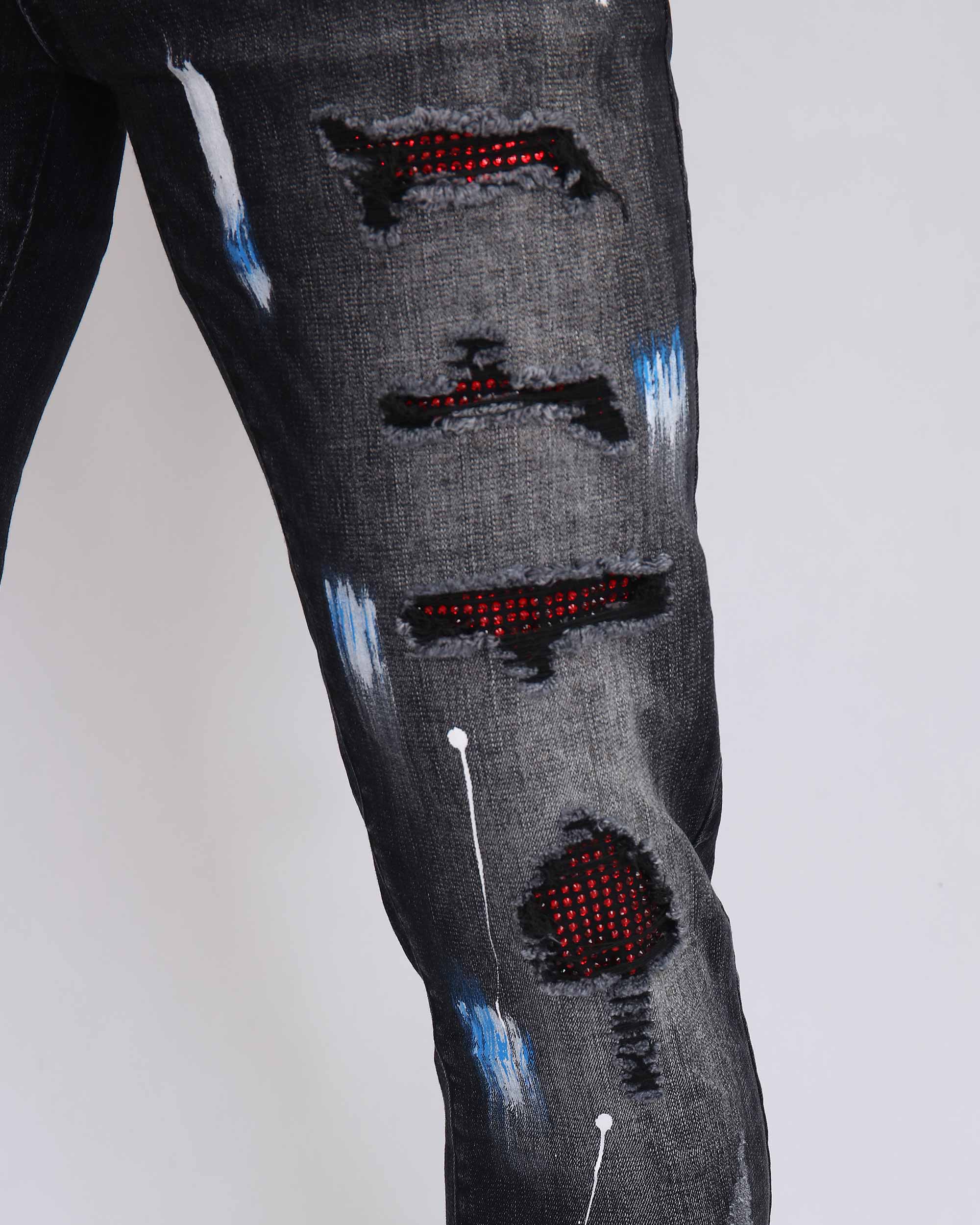 Ripped Black Jeans with Graffiti Paint Drawing - The Rising Fenix
