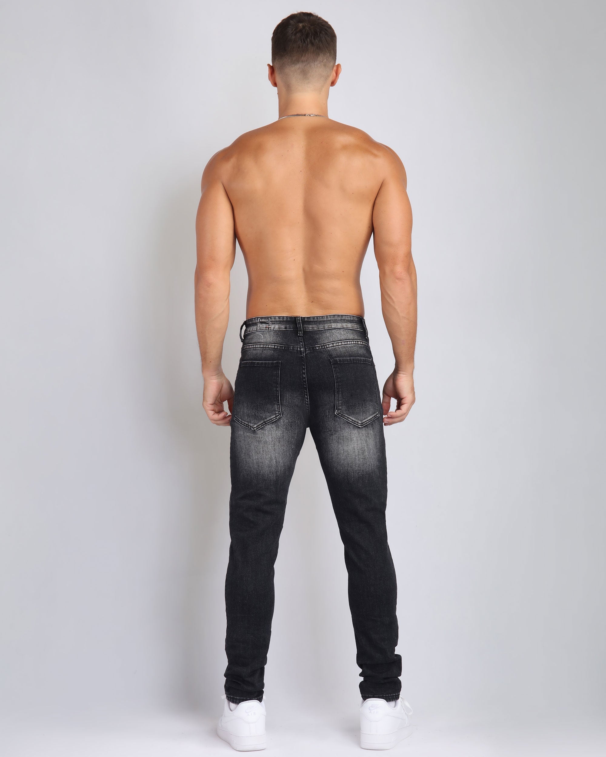 Ripped Black Jeans with Graffiti Paint Drawing - The Rising Fenix