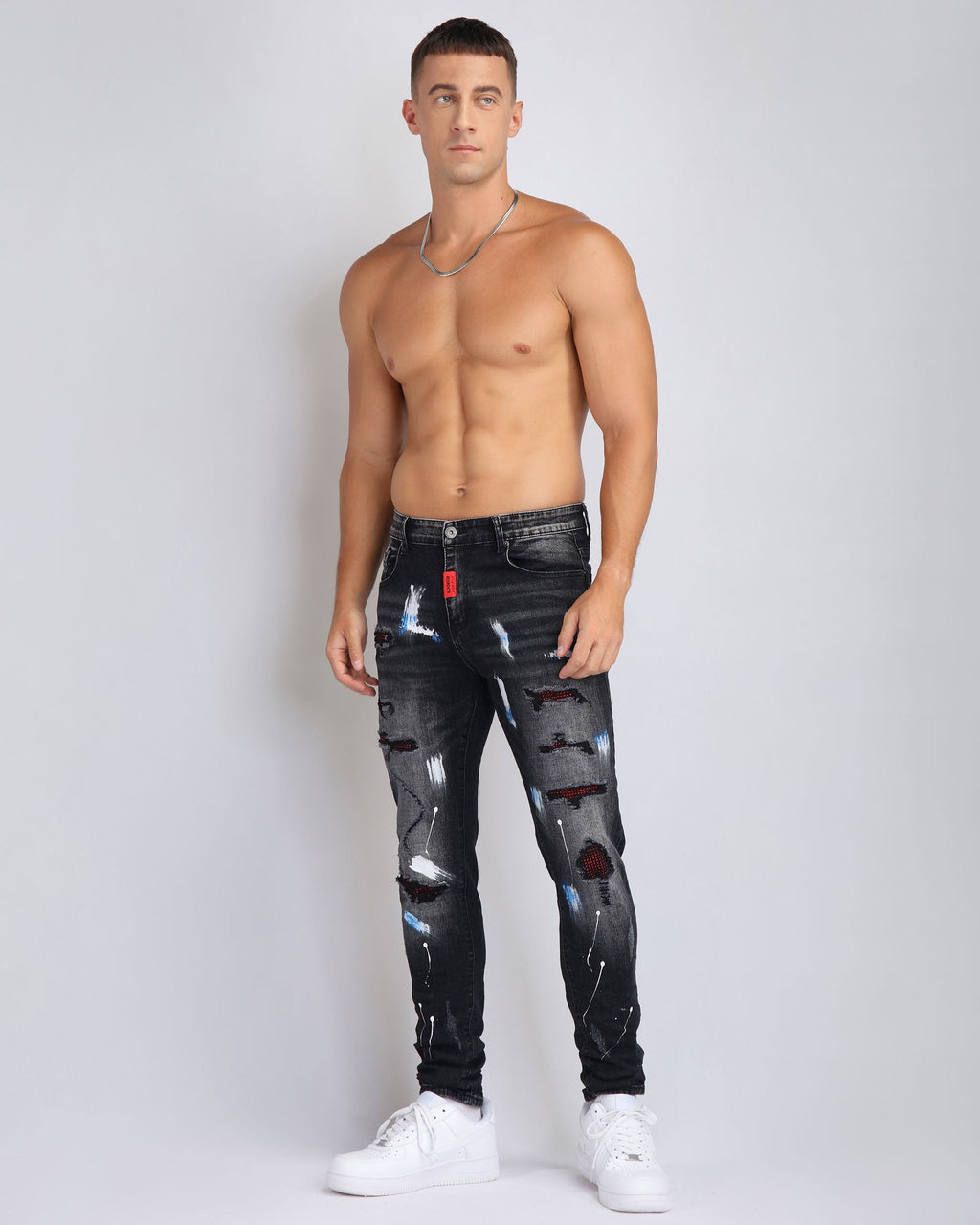 Ripped Black Jeans with Graffiti Paint Drawing - The Rising Fenix