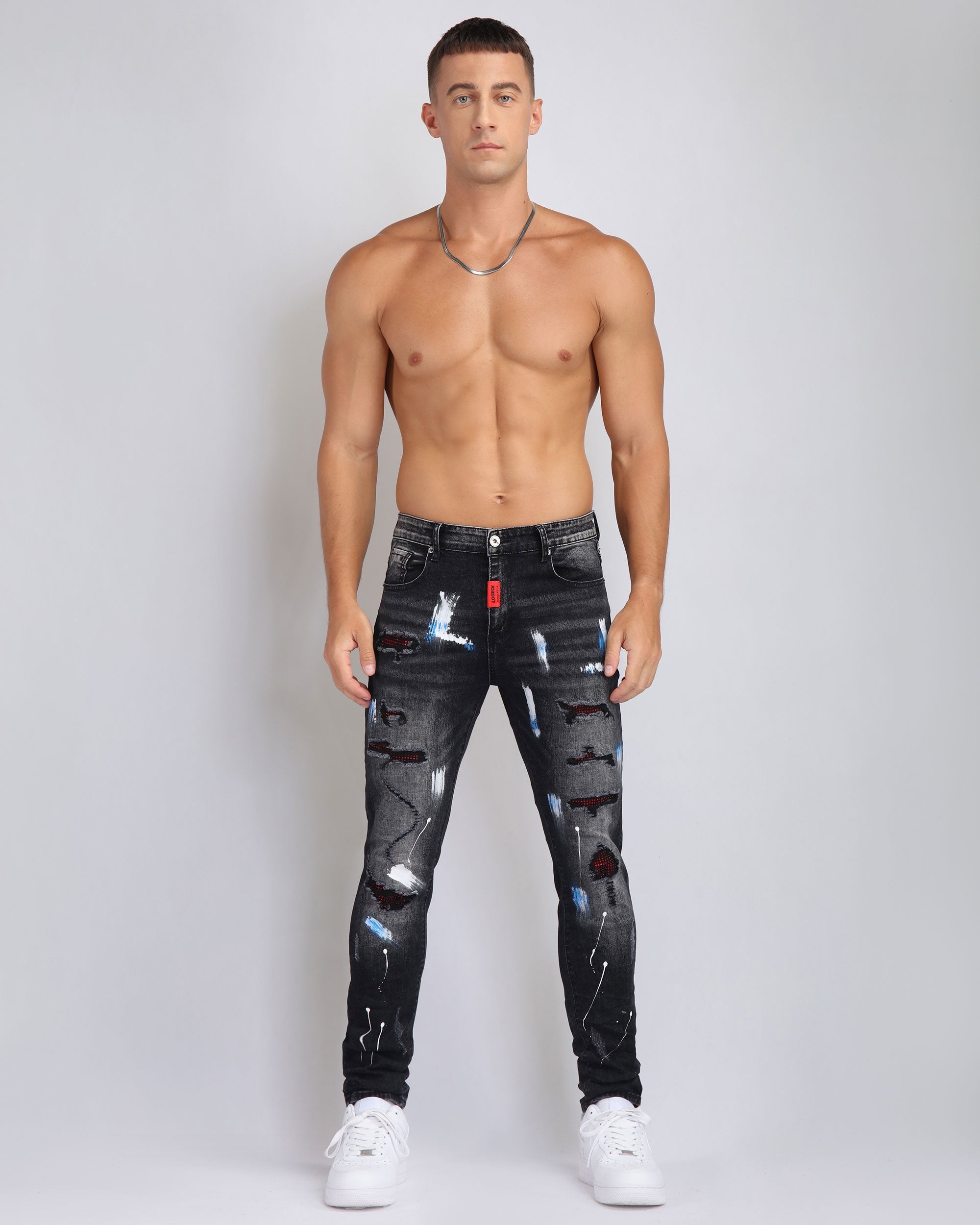 Ripped Black Jeans with Graffiti Paint Drawing - The Rising Fenix