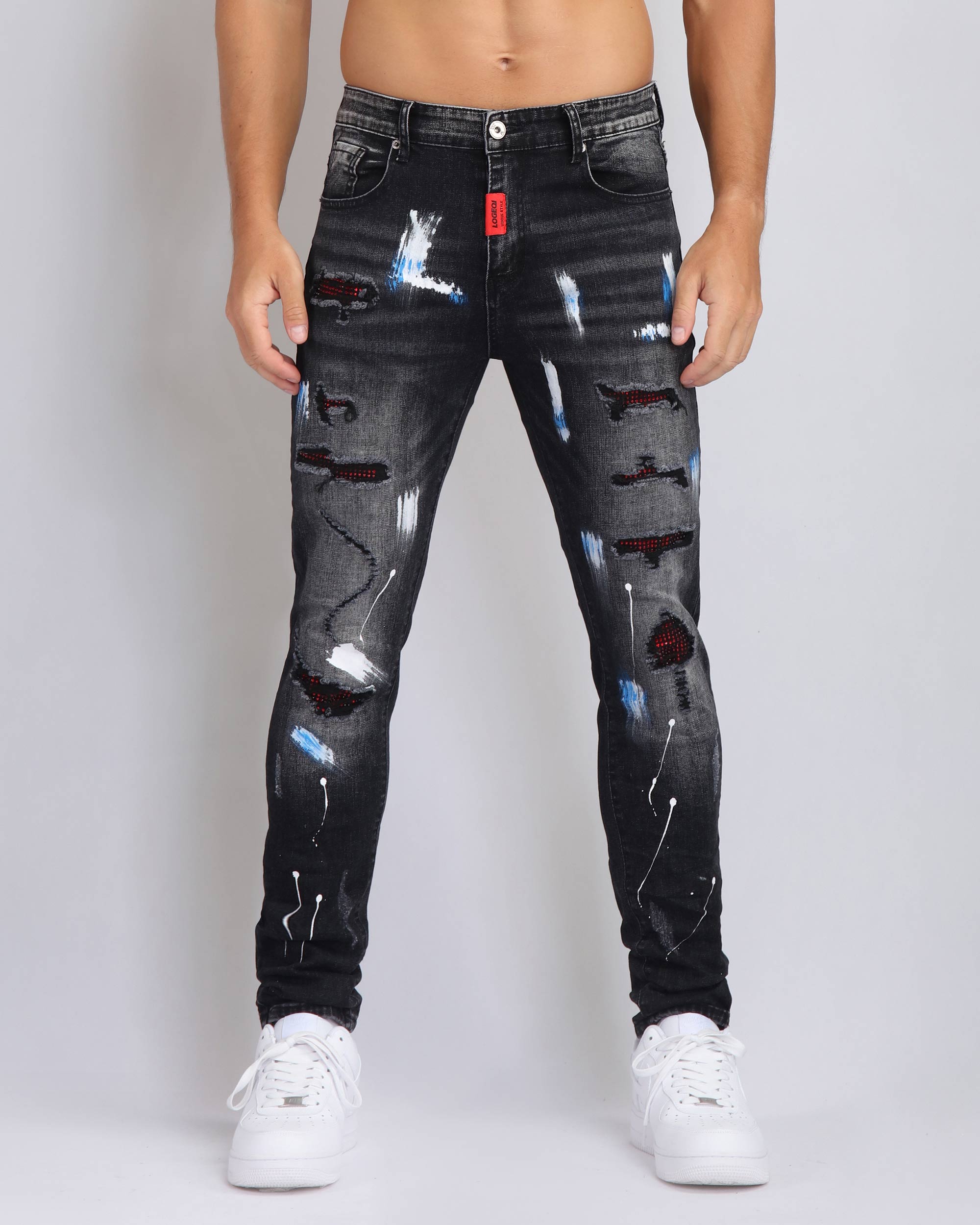 Ripped Black Jeans with Graffiti Paint Drawing - The Rising Fenix
